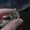 Medium Silver Gotland Crystal Lens Pendant -The Viking Dragon sn silver crystal lens pendant 20mm medium in finger and thumb