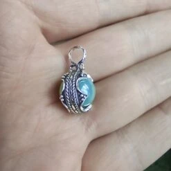 Small Silver Gotland Aventurine Ball Pendant 10 Small Silver Gotland Aventurine Ball Pendant -The Viking Dragon sn silver gotland ball pendant aventurine ball in hand side view