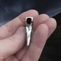 Silver Knotwork Viking Axe Head Pendant -The Viking Dragon sn silver knotwork axe head pendant in hand underside view