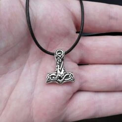 Small Silver Interlace Thors Hammer Pendant 7 Small Silver Interlace Thors Hammer Pendant -The Viking Dragon sn silver small interlace thors hammer pendant on leather thong on hand