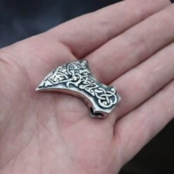 Silver Tyr And Fenrir Viking Axe Head Pendant -The Viking Dragon sn silver viking axe head pendant tyr and fenrir on hand other angle view