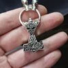 Silver Wolf Thors Hammer Pendant -The Viking Dragon sn silver wolf hammer on split ring on hand