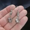 Silver Icelandic Wolf Head Crystal Ball Earrings 2 Silver Icelandic Wolf Head Crystal Ball Earrings -The Viking Dragon sn silver wolf head crystal ball earrings on hand
