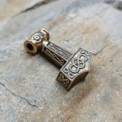 Bronze Odeshög Thors Hammer Pendant -The Viking Dragon wl bronze oseberg thors hammer on rock side view