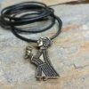 Bronze Valkyrie Pendant 1 Bronze Valkyrie Pendant -The Viking Dragon wl bronze valkyrie pendant on thong on rock