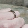 Bronze Braided Viking Ring -The Viking Dragon wl twisted bronze viking ring on finger clenched